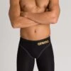 Combinaison De Natation Homme Arena Powerskin Carbon Core Fx Black 1 Combinaison De Natation Homme Arena Powerskin Carbon Core Fx Black -Natation Équipement Magasin 003659 105 m pwskin carbon core fx jammer 001 o